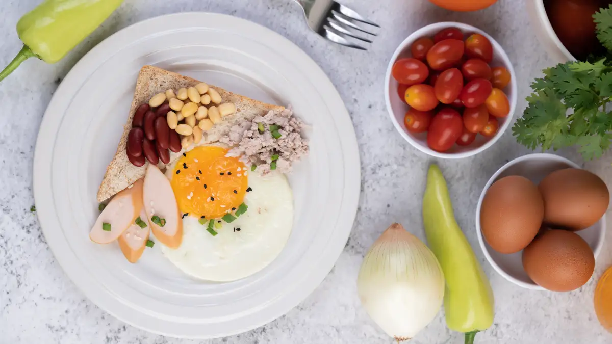 Assorted plate of and egg yolks served at breakfast, rich in Vitamin D3 to build stronger bones.