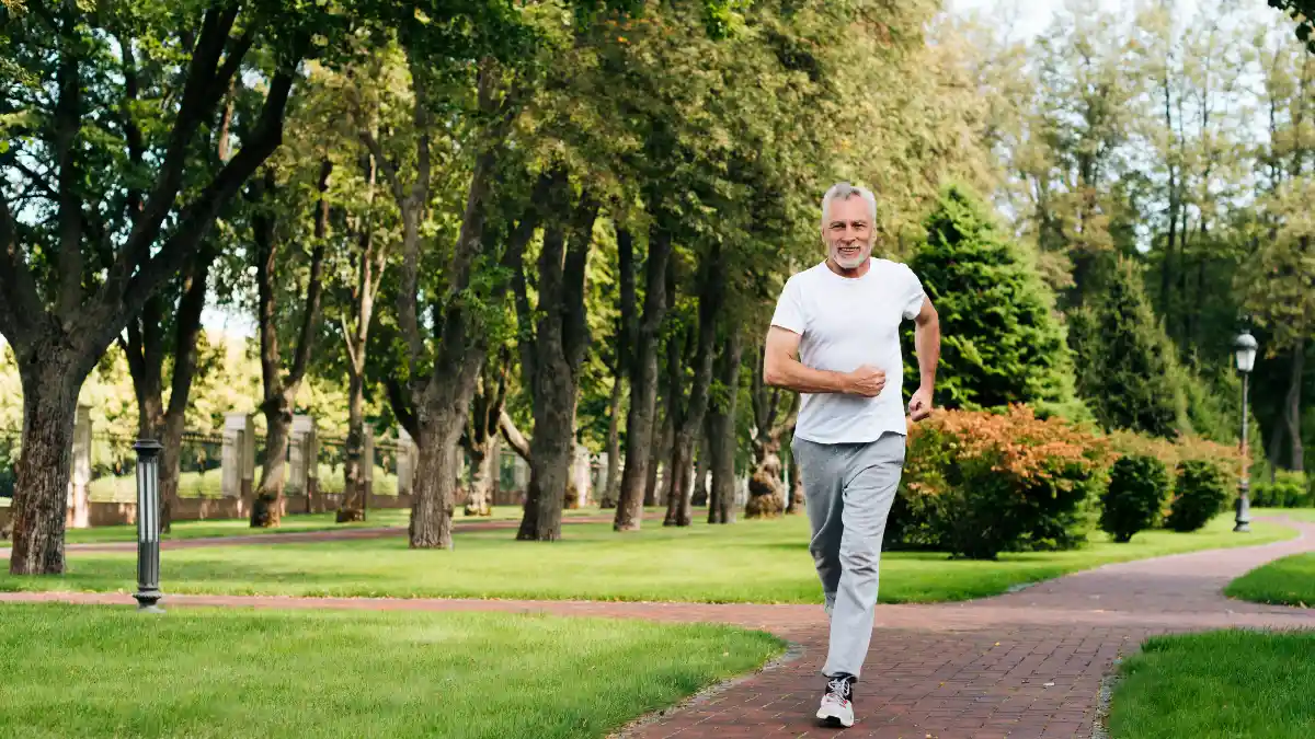 Active man in his 60s maintains heart health and blood flow with a steady morning walk
