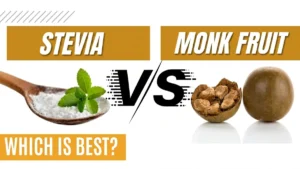 Comparison banner of Stevia vs Monk Fruit with text asking which is best, featuring green leaves and dried monk fruit.