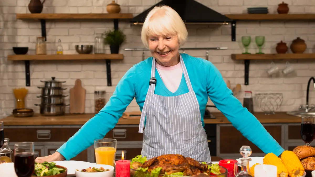 Empowered mature woman preparing a nutrient-dense meal to support basal metabolic rate and bone health after 50.